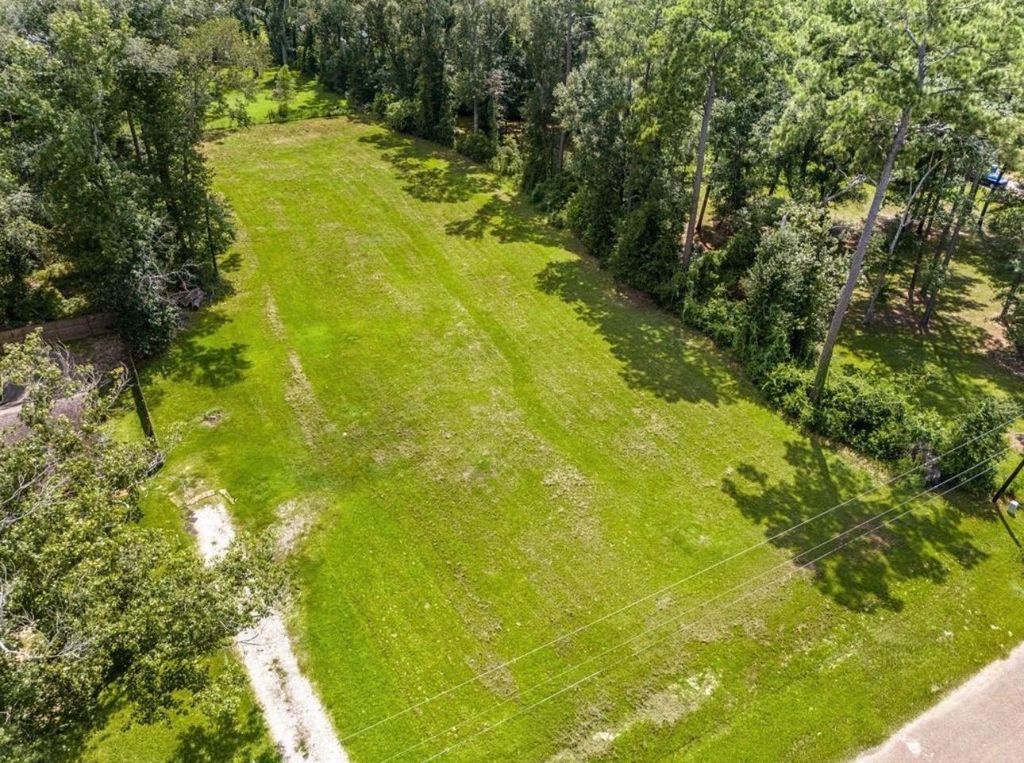 Photo of 55 Woodbranch B Drive, New Caney, TX 77357 (MLS # 53882317)