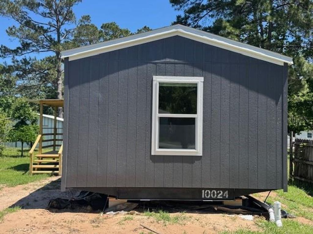 Photo of 21071 Pinetex St, New Caney, TX 77357 (MLS # 92173676)