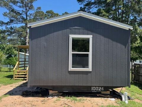 Photo of 21071 Pinetex St, New Caney, TX 77357 (MLS # 92173676)