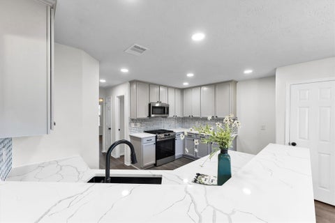 Photo of 13619 Barons Lake Lane, Cypress, TX 77429 (MLS # 54241743)