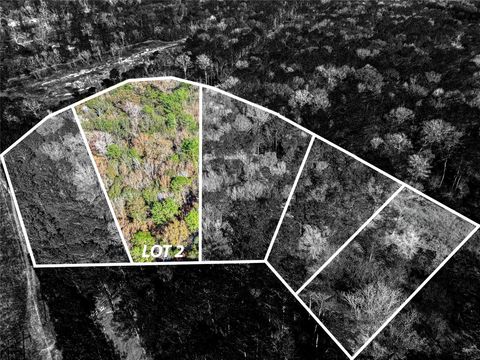 Photo of 0 Roman Forest Tbd, Roman Forest, TX 77357 (MLS # 10740168)