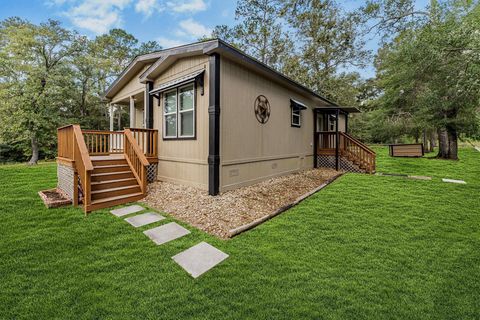 Photo of 120 Coyote Run, Willis, TX 77378 (MLS # 79997289)