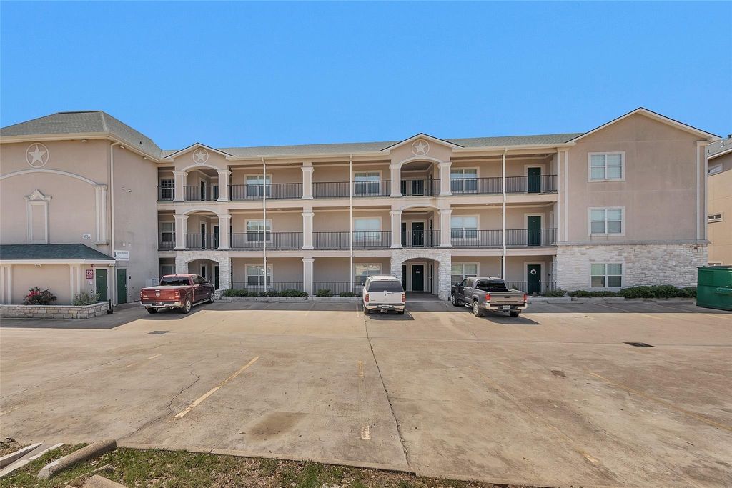 Photo of 7039 Kingston Cove Ln Ln #309, Willis, TX 77318 (MLS # 28657446)