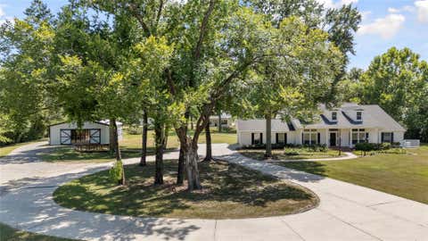 Photo of 9915 Hufsmith Kuykendahl RD, Tomball, TX 77376 (MLS # 17485774)