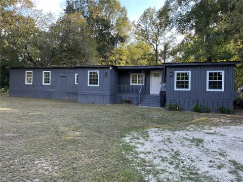 Photo of 10908 L And M Road, Montgomery, TX 77316 (MLS # 95874273)