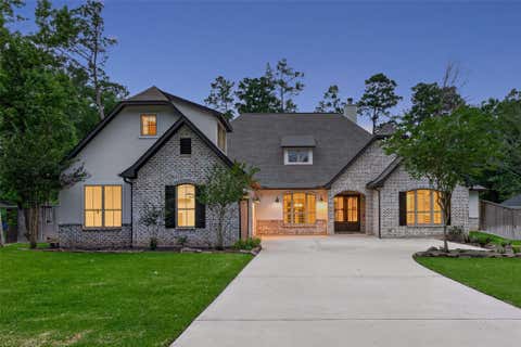 Photo of 2407 Chantilly Lane Lane, Conroe, TX 77384 (MLS # 98979669)