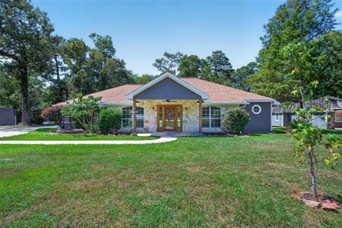 Photo of 25709 Parkway Drive, Huffman, TX 77336 (MLS # 26799624)
