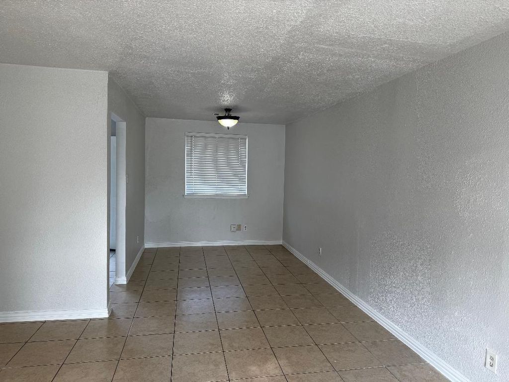 Photo of 12643 Chiswick Road, Houston, TX 77047 (MLS # 75762104)