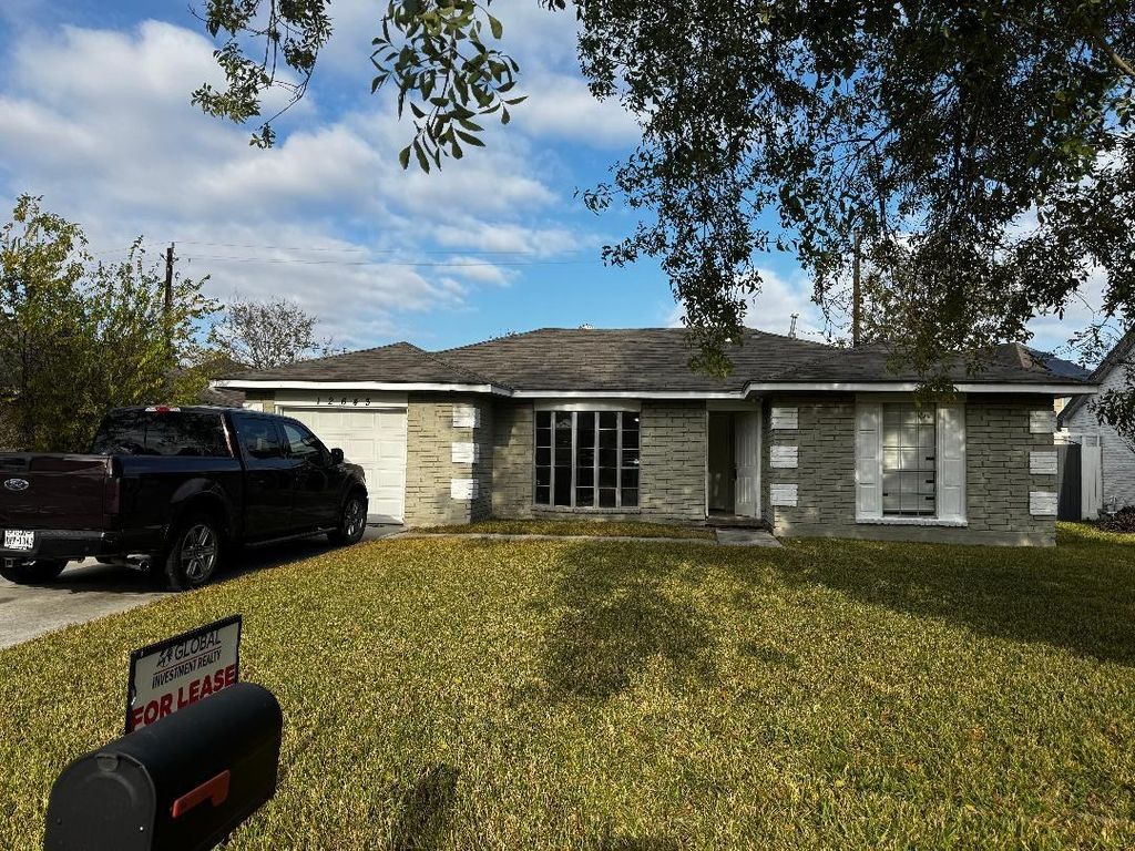 Photo of 12643 Chiswick Road, Houston, TX 77047 (MLS # 75762104)