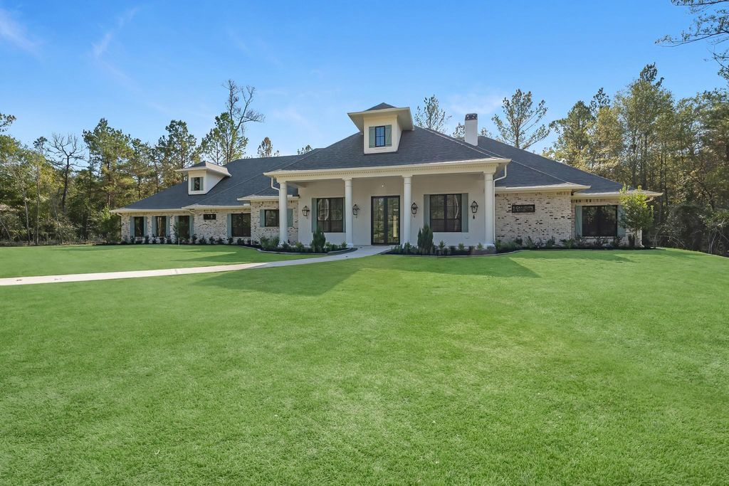 Photo of 26041 Crown Ranch Boulevard, Montgomery, TX 77316 (MLS # 24612246)