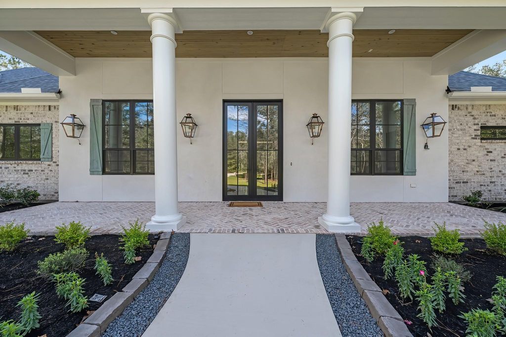 Photo of 26041 Crown Ranch Boulevard, Montgomery, TX 77316 (MLS # 24612246)