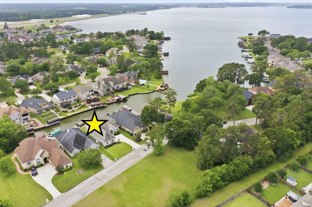 Photo of 12323 Longmire Cove, Conroe, TX 77304 (MLS # 70987045)