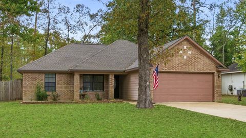 Photo of 10668 Royal Magnolia Drive, Conroe, TX 77303 (MLS # 12159336)