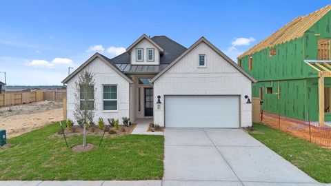 Photo of 14910 Buffalo Head Street, Mont Belvieu, TX 77523 (MLS # 39046142)