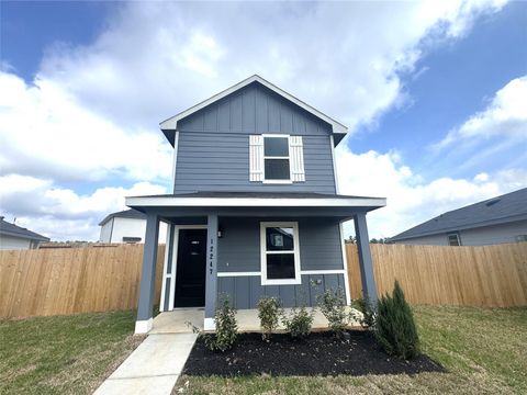 Photo of 12247 Shield Crest Court, Willis, TX 77378 (MLS # 90632971)