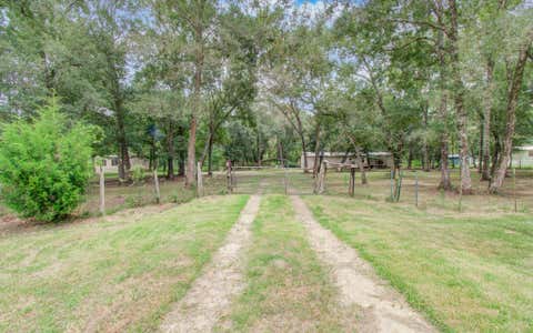 Homes For Sale - 447 County Road 410<br/> Dayton, TX 77535