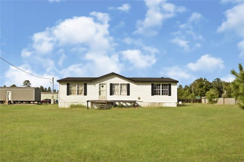 Photo of 849 County Road 5027, Cleveland, TX 77327 (MLS # 25061791)