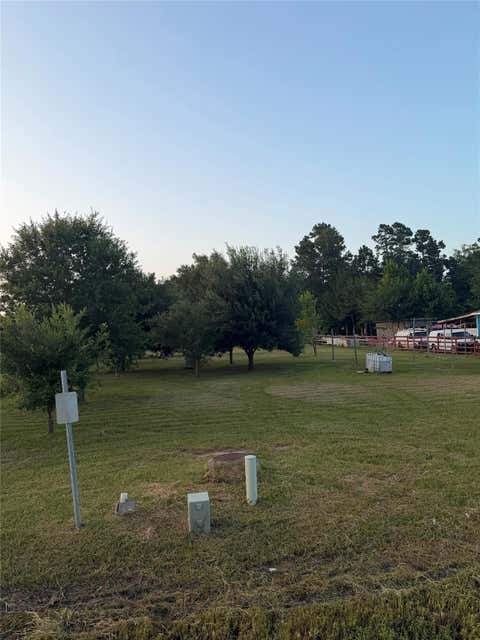 Photo of 1513 County Road 3479a, Cleveland, TX 77327 (MLS # 9869896)