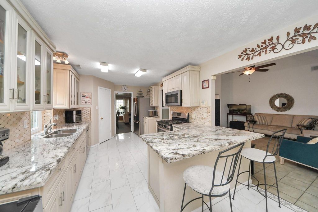 Photo of 3927 Village Well Drive, Humble, TX 77396 (MLS # 98508244)