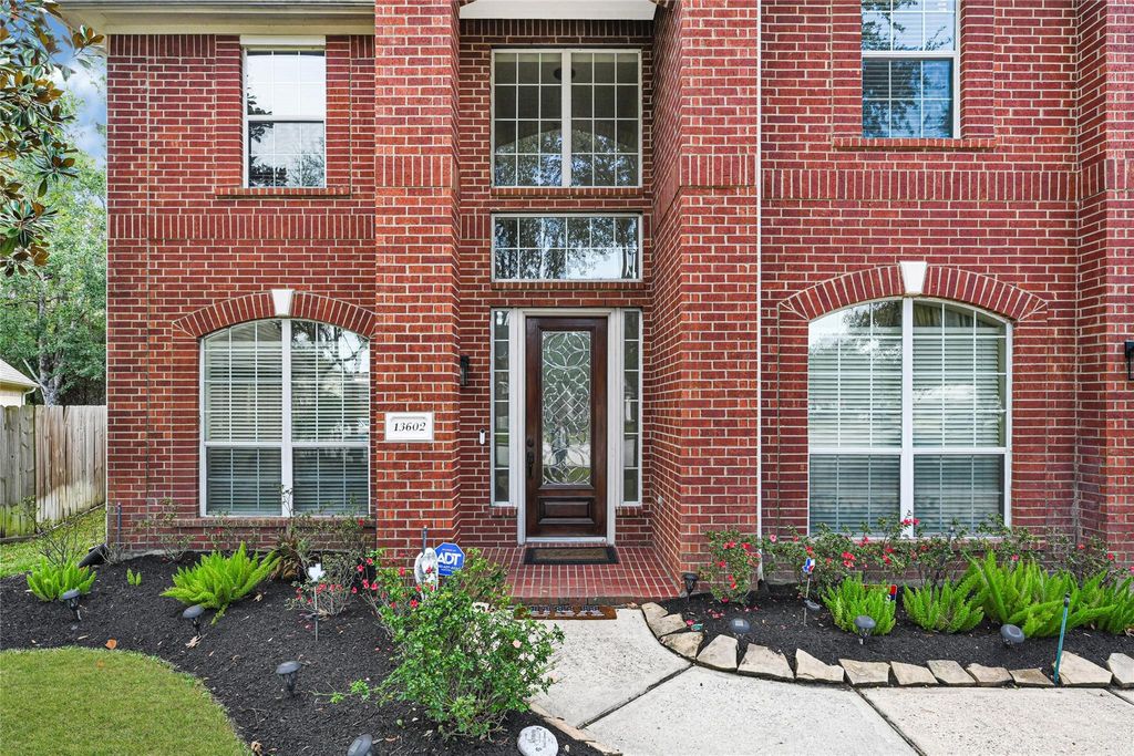 Photo of 13602 Darby Rose Lane, Houston, TX 77044 (MLS # 38460641)