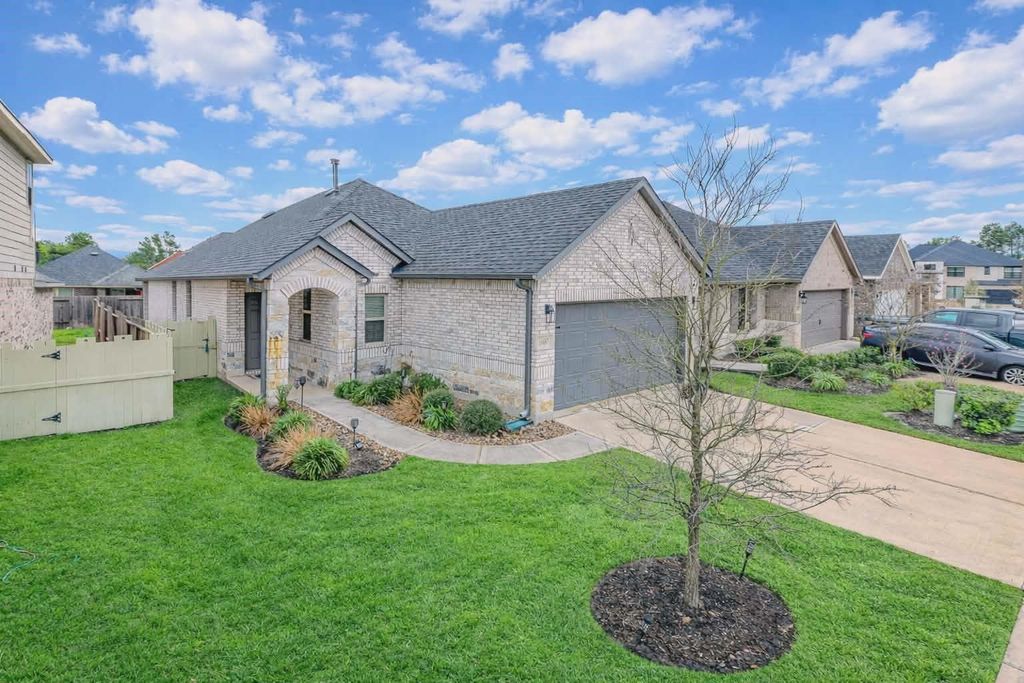 Photo of 16887 Pink Wintergreen Drive, Conroe, TX 77385 (MLS # 51927688)