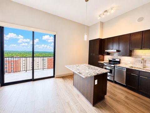 Photo of 9787 Katy Freeway #1708, Houston, TX 77024 (MLS # 34590052)