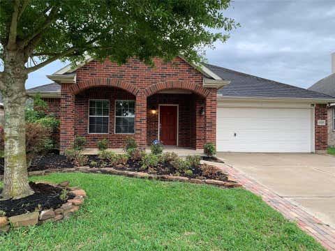 Photo of 13223 Heather Falls Drive, Houston, TX 77065 (MLS # 8492349)