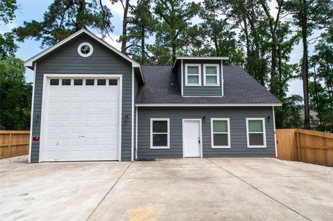 Photo of 519 Magnolia Point Drive #A, Houston, TX 77336 (MLS # 70790177)