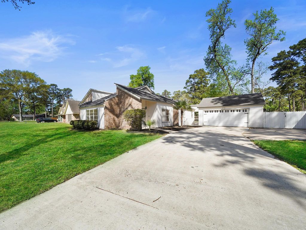 Photo of 715 Saint Andrews Road, Kingwood, TX 77339 (MLS # 30489417)