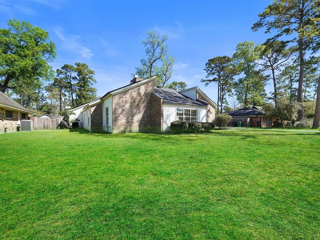 Photo of 715 Saint Andrews Road, Kingwood, TX 77339 (MLS # 30489417)
