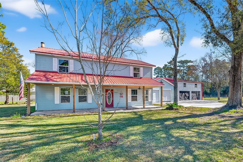 Photo of 25702 Parkway Drive, Huffman, TX 77336 (MLS # 49126666)