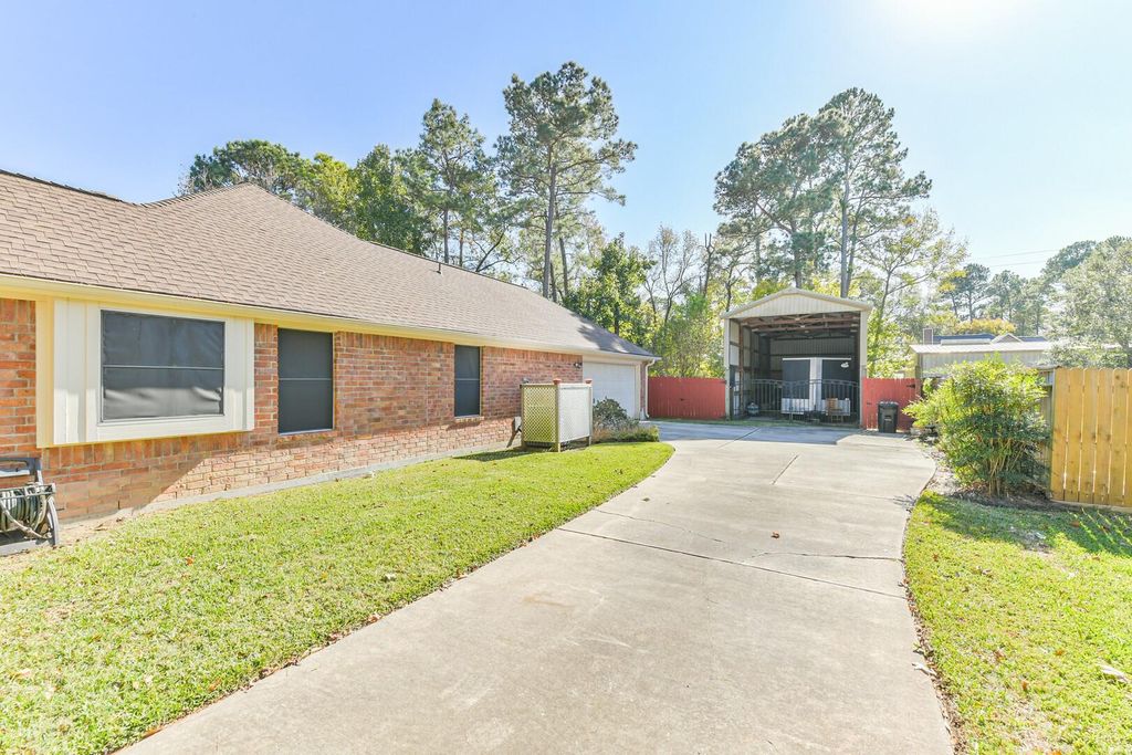 Photo of 5803 Lotus Lane, Magnolia, TX 77354 (MLS # 94599236)