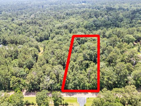 Photo of TBD Country Club Dr, New Caney, TX 77536 (MLS # 84125362)