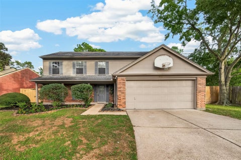 Photo of 7410 Magnolia Shadows Lane, Houston, TX 77095 (MLS # 64795636)