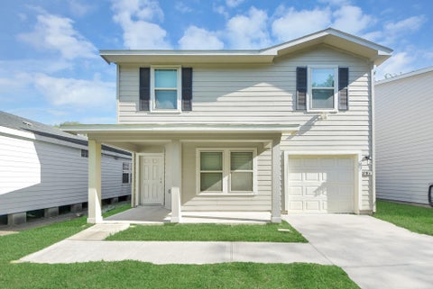 Photo of 606 Travis Street, Baytown, TX 77520 (MLS # 94398604)
