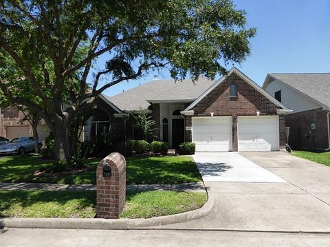 Photo of 12530 Meadowglen Drive, Meadows Place, TX 77477 (MLS # 98050624)