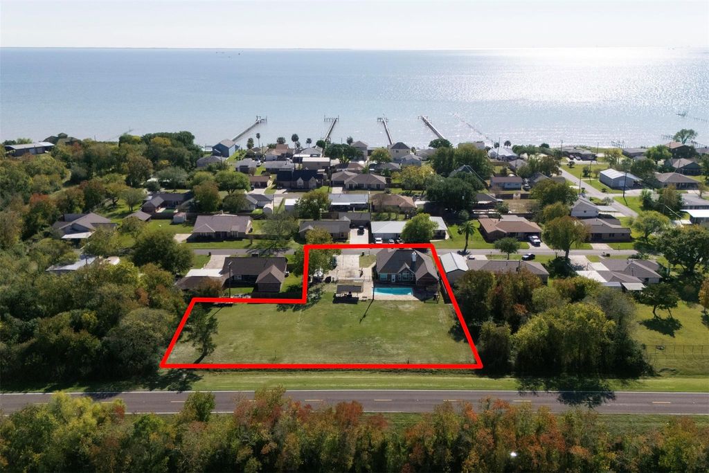 Photo of 8015 Bayview Drive, Beach City, TX 77523 (MLS # 18588297)