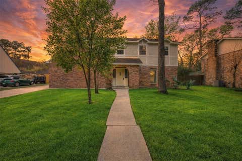Photo of 7611 Theisswood Road, Spring, TX 77379 (MLS # 71566370)