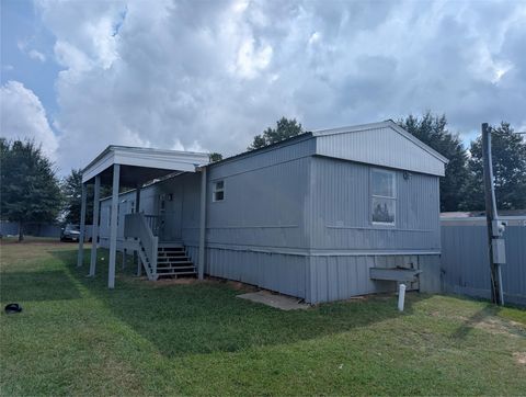 Photo of 608 Country Road 5102i, Cleveland, TX 77327 (MLS # 78424589)