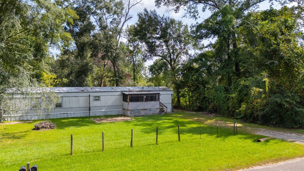 Photo of 27457 Burning Tree, New Caney, TX 77357 (MLS # 32608577)