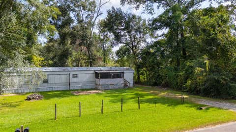 Photo of 27457 Burning Tree, New Caney, TX 77357 (MLS # 32608577)