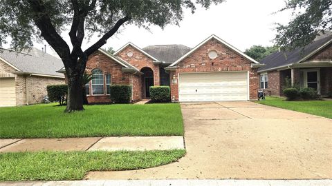 Photo of 2014 Pinecreek Pass Lane, Katy, TX 77449 (MLS # 56089708)