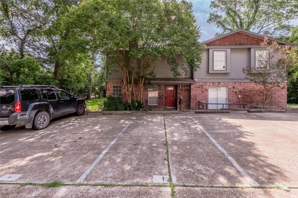 Photo of 1228 Avenue O #H, Huntsville, TX 77340 (MLS # 96508497)
