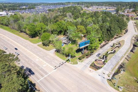 Photo of 6020 Highway 105, Conroe, TX 77304 (MLS # 92094501)
