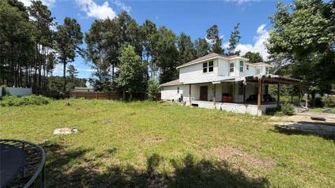 Photo of 192 Road 51023, Cleveland, TX 77327 (MLS # 4135509)