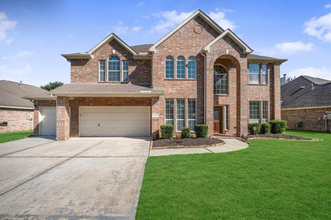 Photo of 8719 Rolling Rapids Road, Humble, TX 77346 (MLS # 42530104)