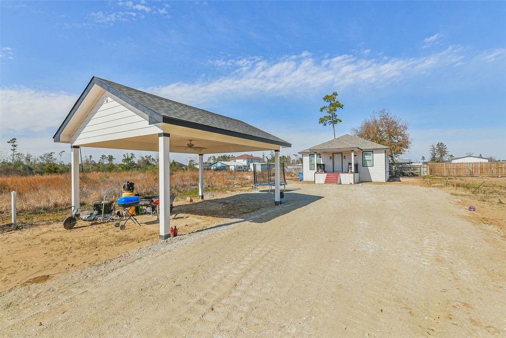 Photo of 165 Road 5215, Cleveland, TX 77327 (MLS # 84203574)