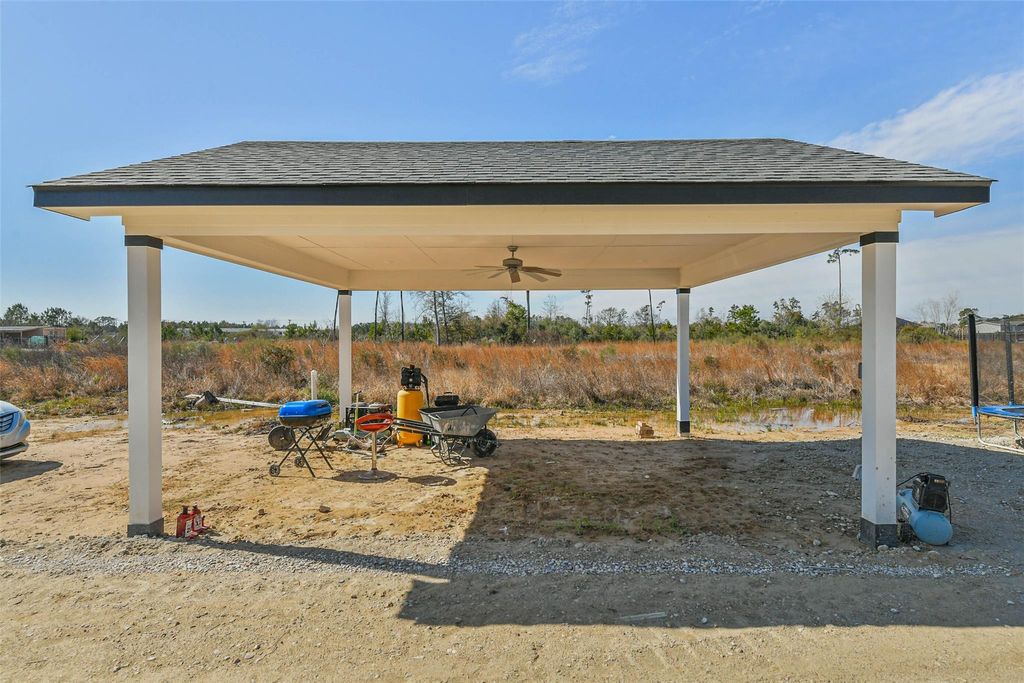 Photo of 165 Road 5215, Cleveland, TX 77327 (MLS # 84203574)