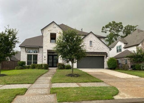 Photo of 12010 Walden Pines Road, Humble, TX 77346 (MLS # 23338379)