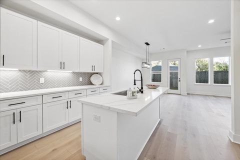 Photo of 9418 Rain Mood Lane, Houston, TX 77080 (MLS # 98400496)